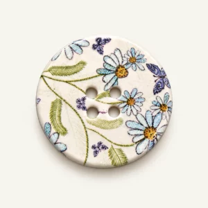 Bouton fleuri marguerites bleues